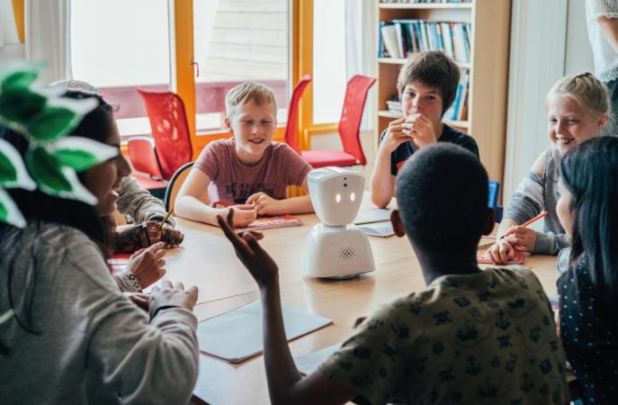 Using Robots to Help Absent Children to Attend Class Remotely