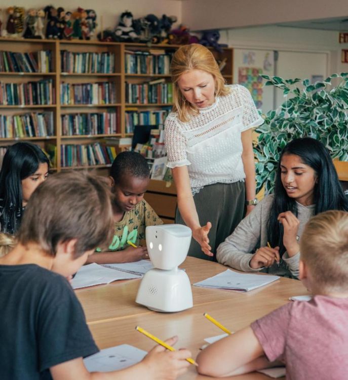 Using Robots to Help Absent Children to Attend Class Remotely