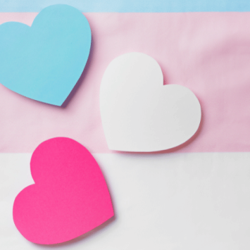 Blue, white and pink hearts representing trans children
