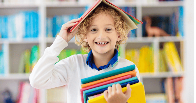 Boy in library for International Literacy Day