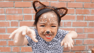 Girl dressed in cat costume for World Book Day