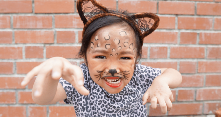 Girl dressed in cat costume for World Book Day
