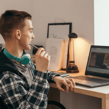 Student at home watching video, to represent flipped learning