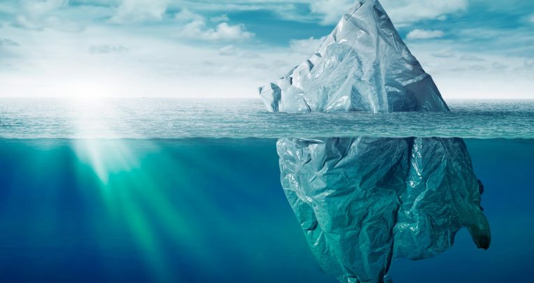 Iceberg seen above and below waves, representing World Ocean Day activities