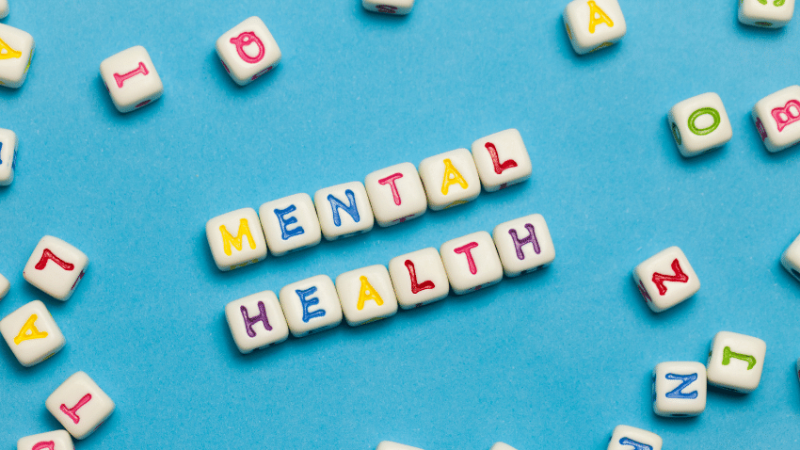Tiles spelling out Mental Health, representing World Mental Health Day activities