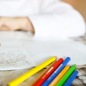 Child writing, representing National Writing Day