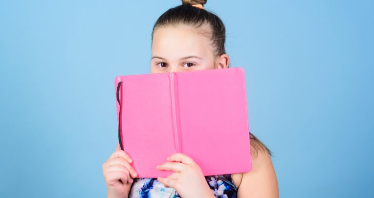 Girl holding diary