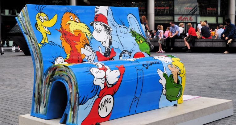 Bench covered in Dr Seuss books illustrations
