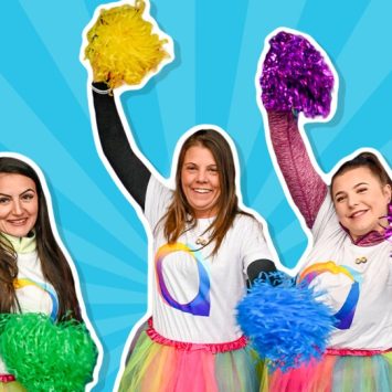 Three women cheerleading for Autism Awareness Week