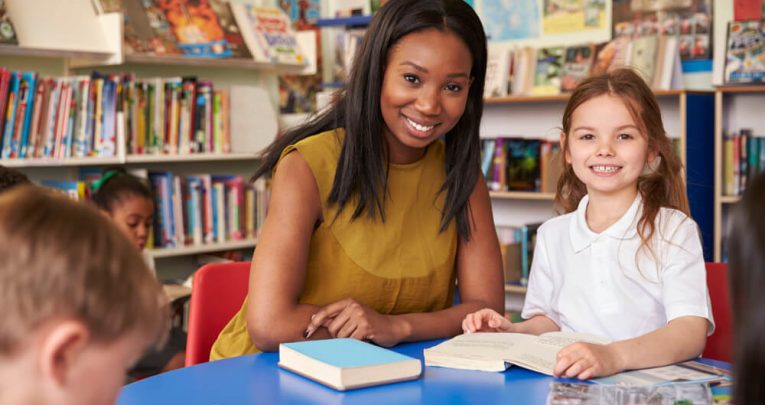 Year 4 teacher and pupil