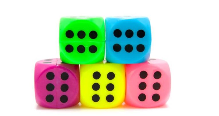 Colourful dice, representing maths games KS1