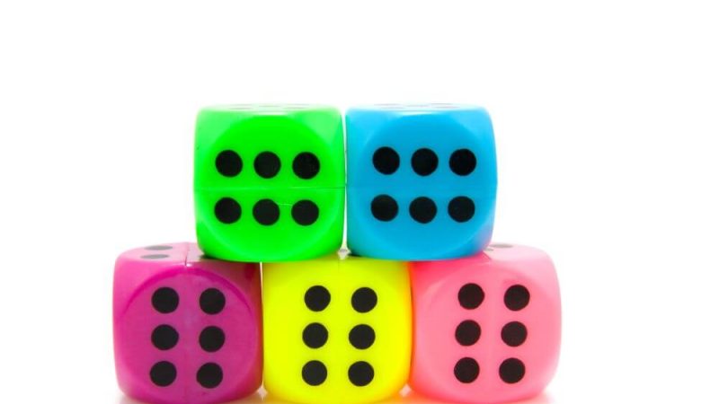 Colourful dice, representing maths games KS1