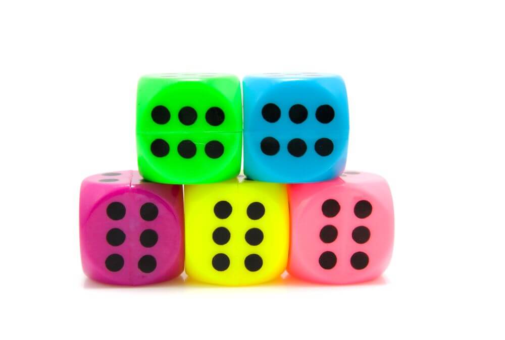 Colourful dice, representing maths games KS1