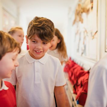 Primary children talking in corridor