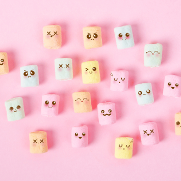 Marshmallows with different facial expressions, representing emotive language KS2