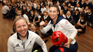 Olympic athletes with schoolchildren