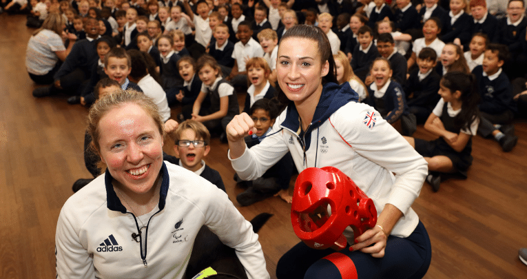 Olympic athletes with schoolchildren