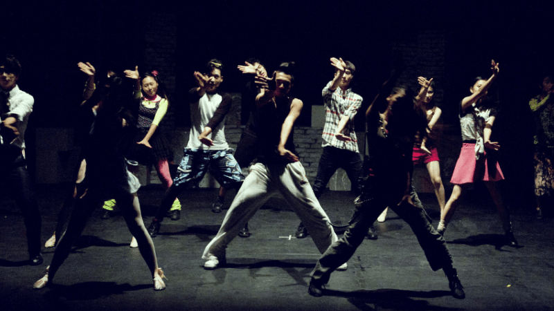 Dances on stage representing cultural capital in education