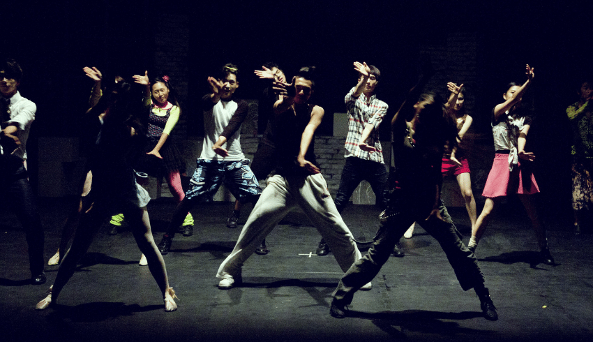 Dances on stage representing cultural capital in education