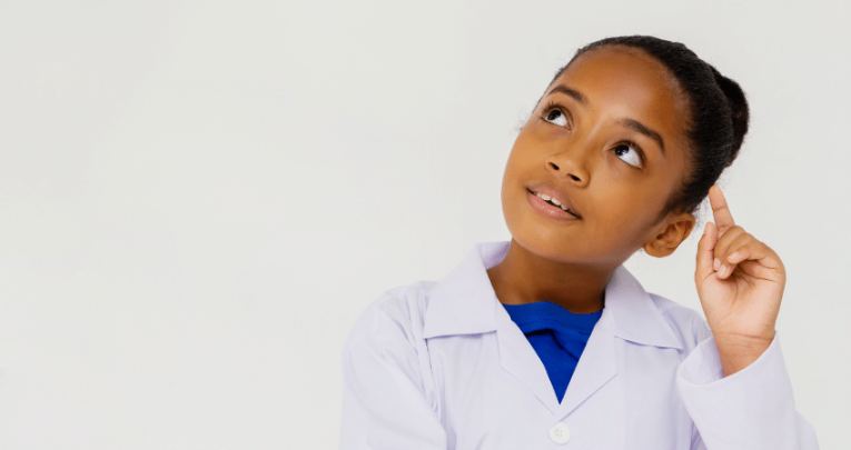 Girl in lab coat on science trip