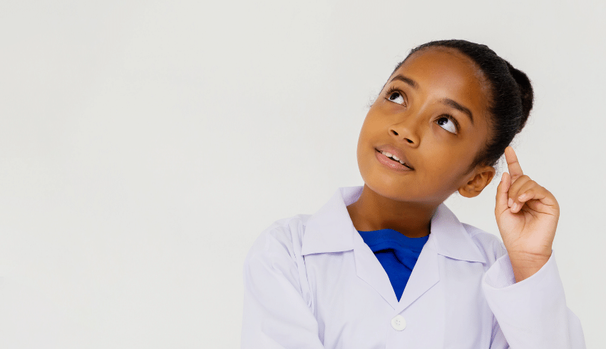 Girl in lab coat on science trip