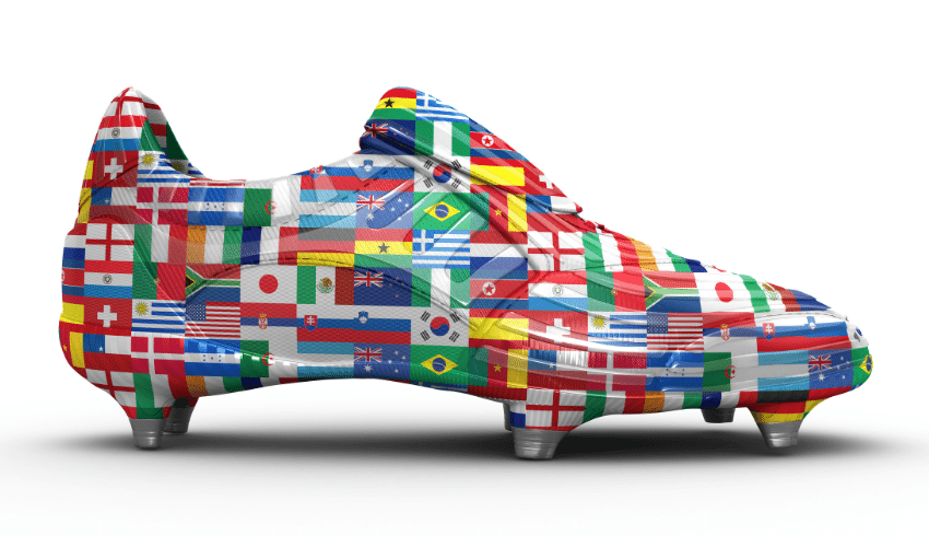 Flag covered football boot representing 2022 FIFA World Cup