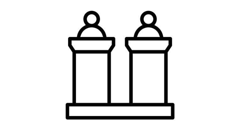 monochrome icon showing two figures engaged in debate