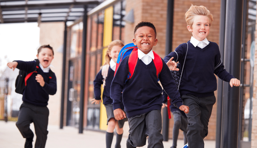 KS1 pupils running towards camera