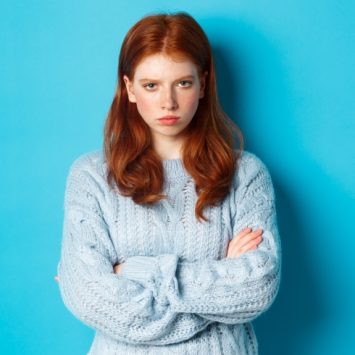 Photograph of angry-looking teenage girl