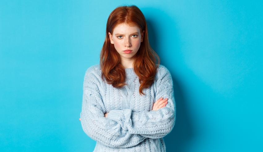 Photograph of angry-looking teenage girl