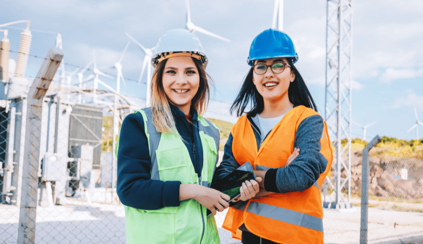 Women wearing engineering hats