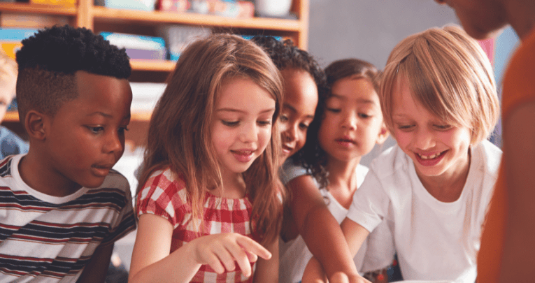 Children in classroom learning phonics