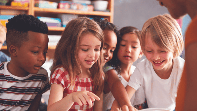 Children in classroom learning phonics