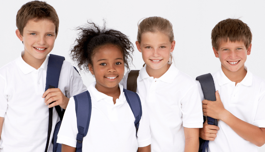 School children smiling representing end of year activities