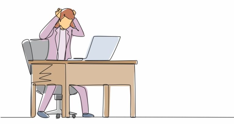 Illustration of frustrated teacher sat at a classroom desk