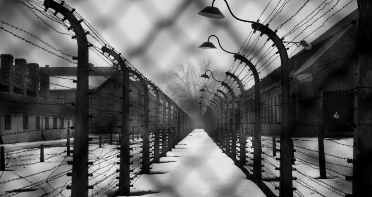 Black and white photo taken at Auschwitz-Birkenau main concentration camp circa 2017