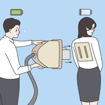 Cartoon illustration of one suited figure inserting a mains plug into the back of another suited figure to 'recharge' them, representing teacher wellbeing