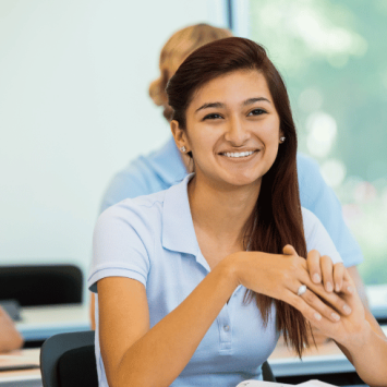 Teenager in classroom to represent concept of interleaving