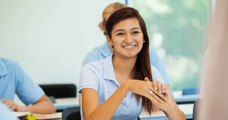 Teenager in classroom to represent concept of interleaving