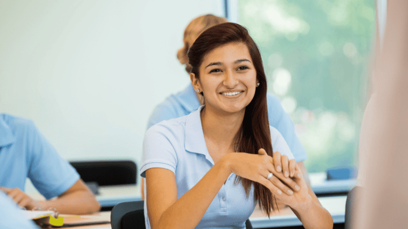 Teenager in classroom to represent concept of interleaving