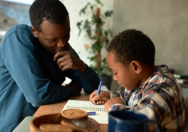 Boy taking part in Black History Month activities