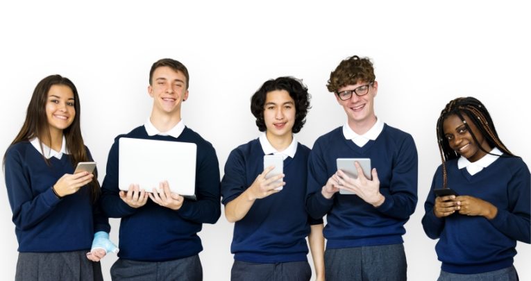 Photo of five smiling 14- to 15-year-old Year 10 school students