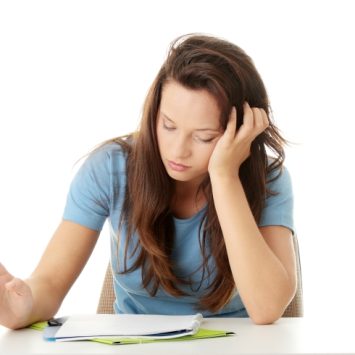 Photo of teenage girl studying, representing ongoing assessment
