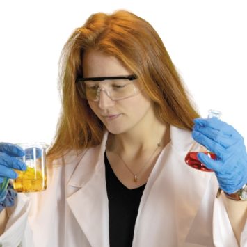 Girl in lab coat, representing interdisciplinary learning