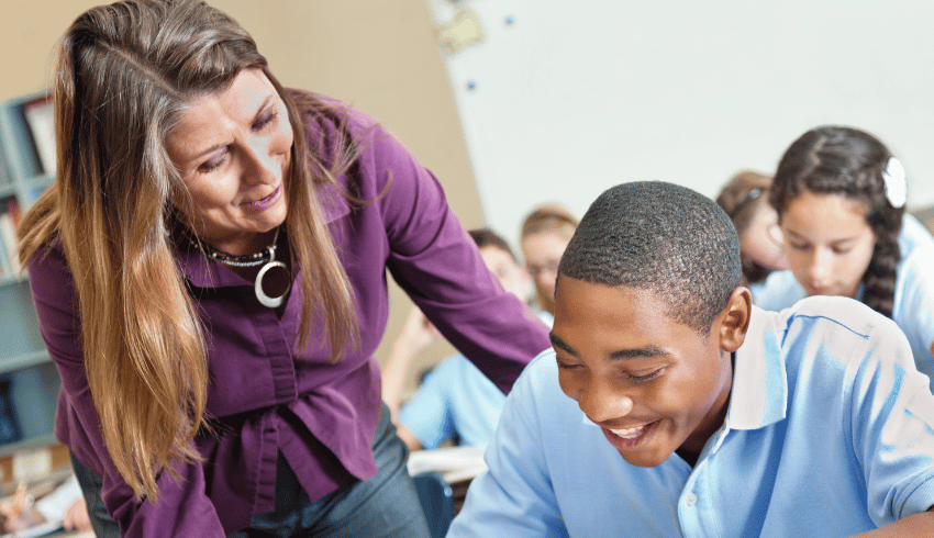 Female teacher and male student, representing behaviour management strategies