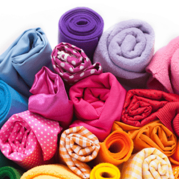 A bundle of brightly coloured textiles