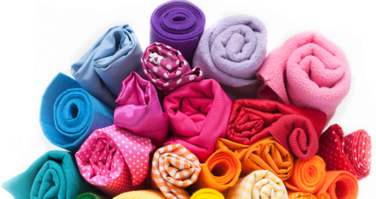 A bundle of brightly coloured textiles