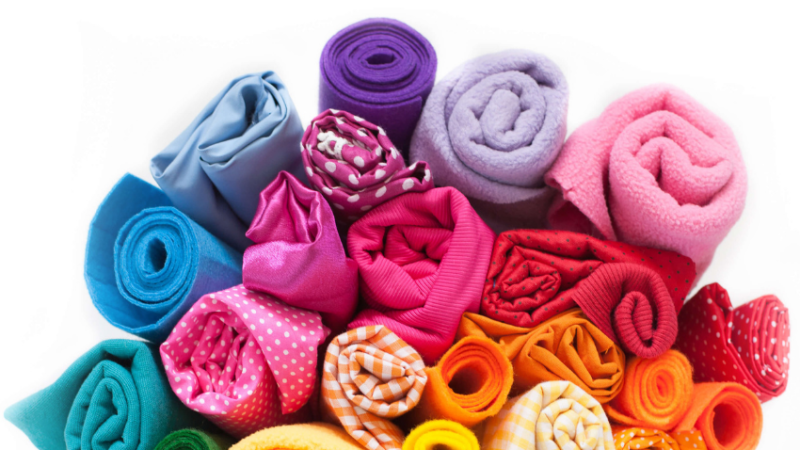 A bundle of brightly coloured textiles