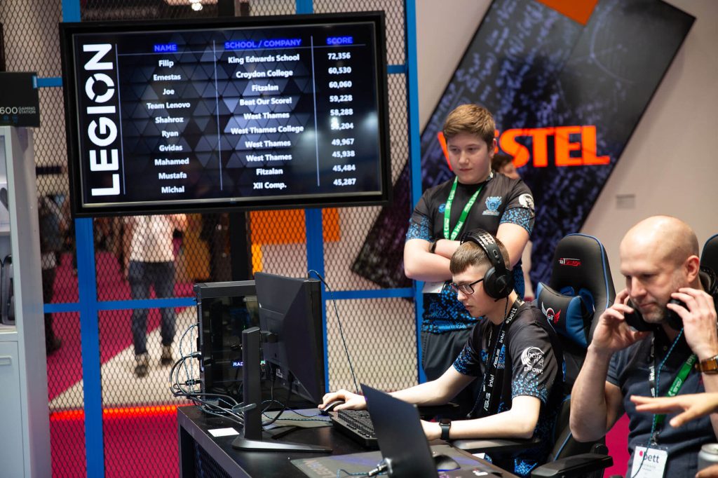 Teenagers using computers at Bett Show