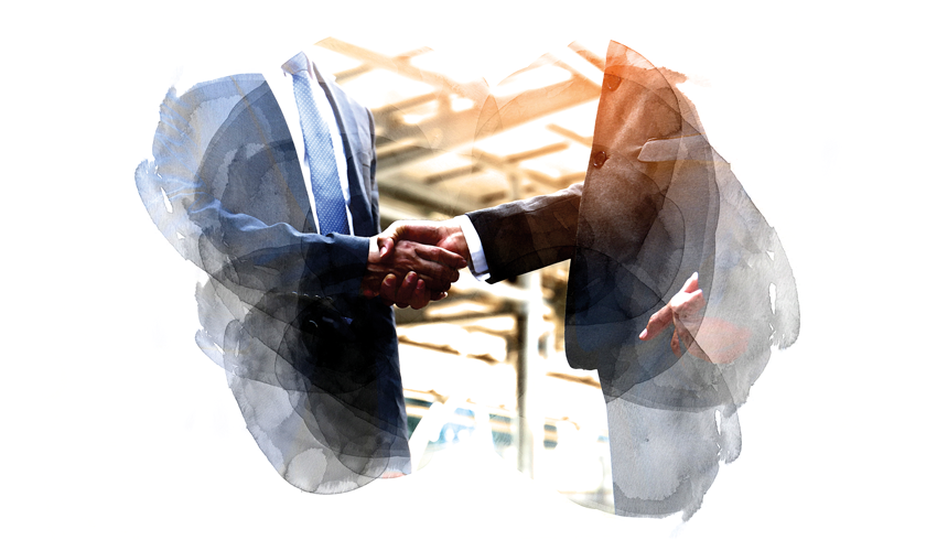 Two men in suits shaking hands, representing CPD for teachers